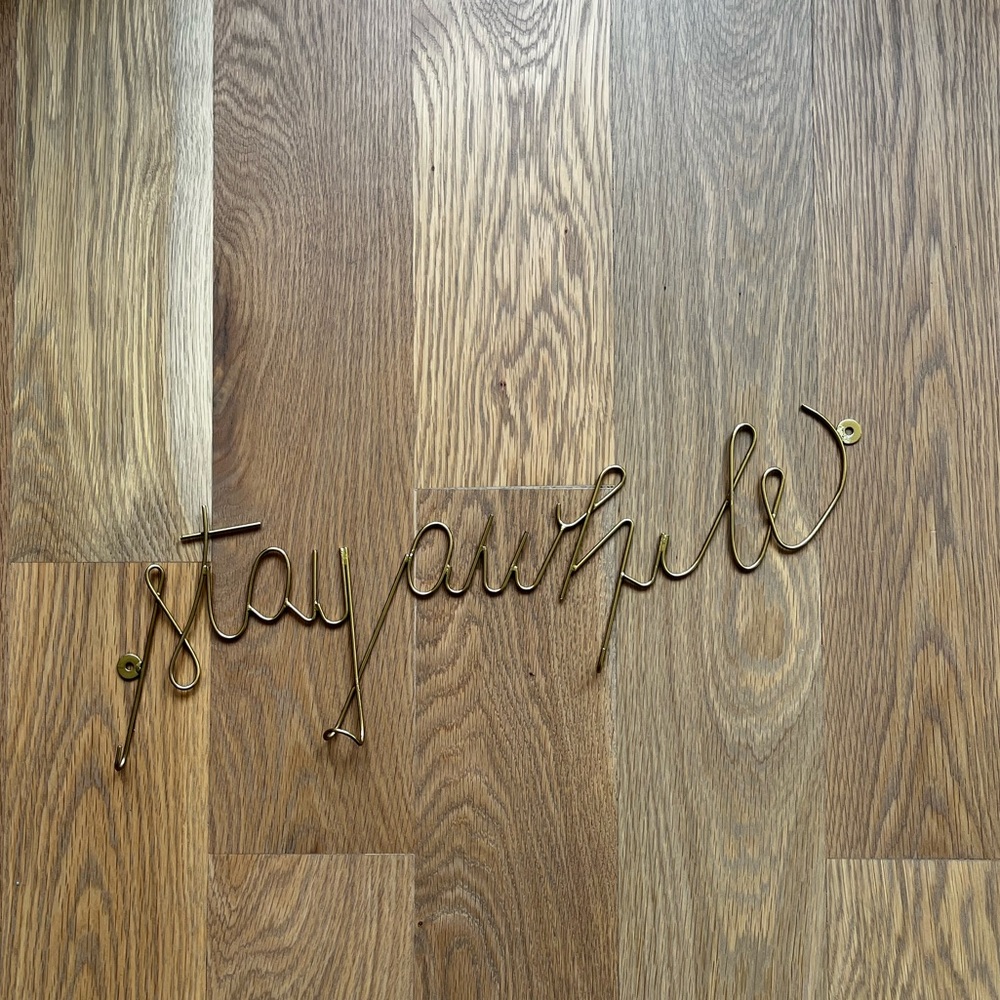 Gold “Stay awhile” key holder